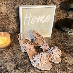 Beige fringe tie-up sandals with tassels